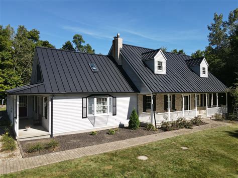 black metal roof on manufactured house|black matte standing seam metal.